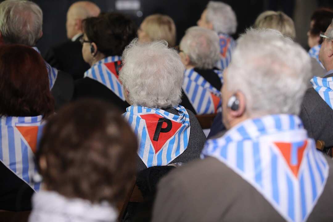 Former prisoners attend a ceremony marking the 73rd anniversary of the liberation of the German concentration camp Auschwitz in Brzezinka, Poland.