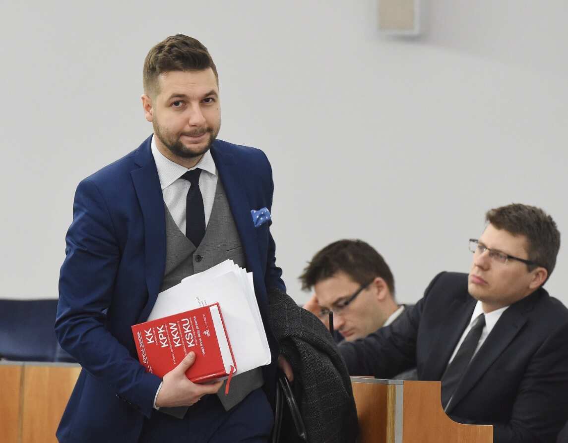 Deputy Minister of Justice Patryk Jaki (L) during the night debate in the Polish Senate in Warsaw, Poland, early 01 February 2018. 