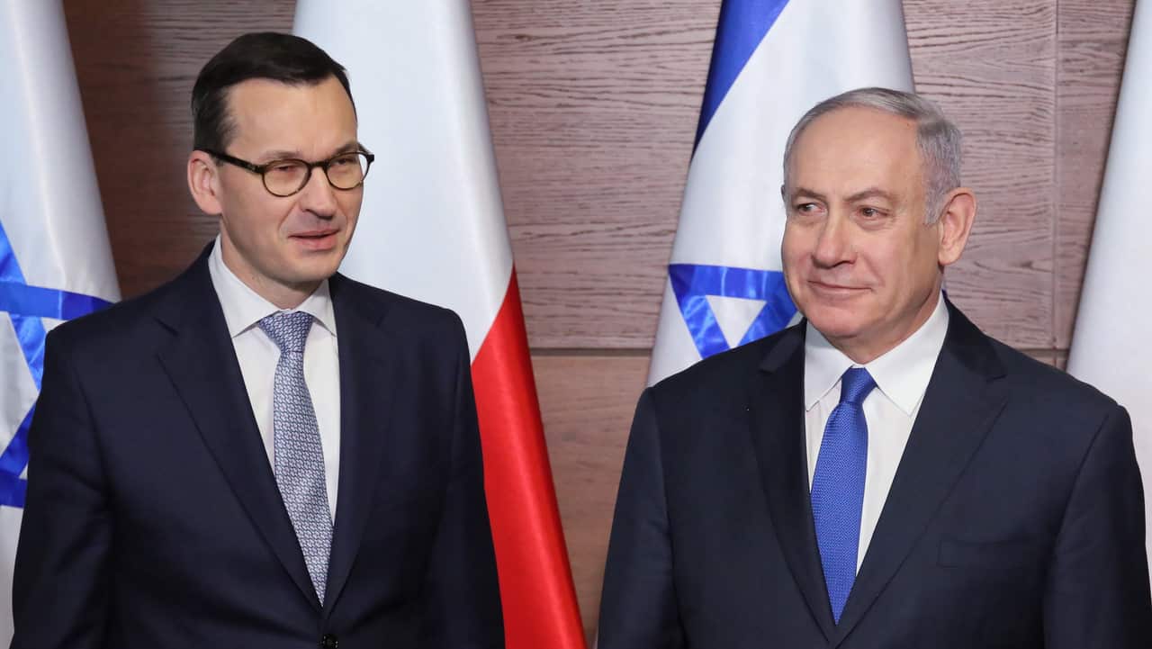 Polish Prmie Minister Mateusz Morawiecki welcomes Israeli Prime Minister Benjamin Netanyahu before their meeting in Warsaw, Poland, 14 February 2019.  