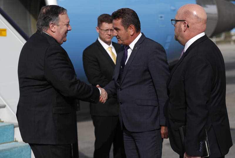 US Secretary of State Mike Pompeo is greeted by Deputy Governor of Ankara Murat Soylu, in Ankara, Turkey.