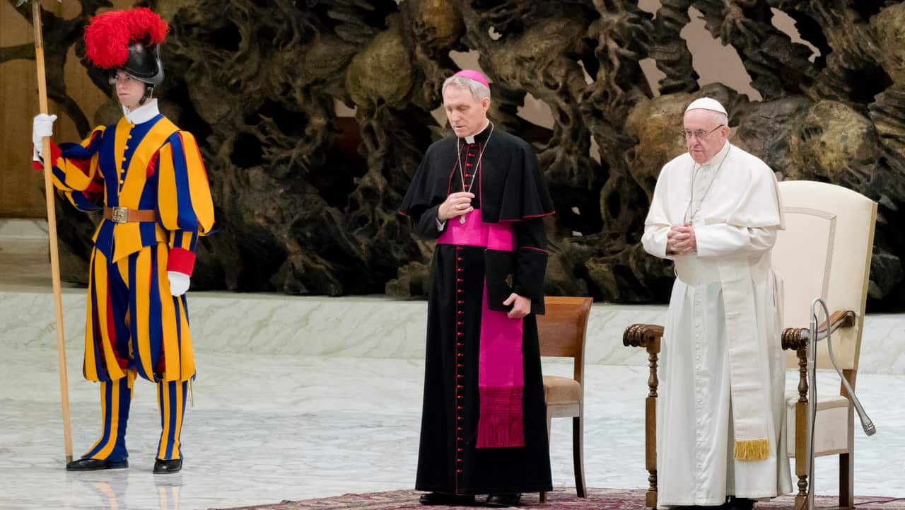 Pope Francis, flanked by Prefect of the Papal Household, Georg Ganswein, during his address in Paul VI hall on December 19, 2018.