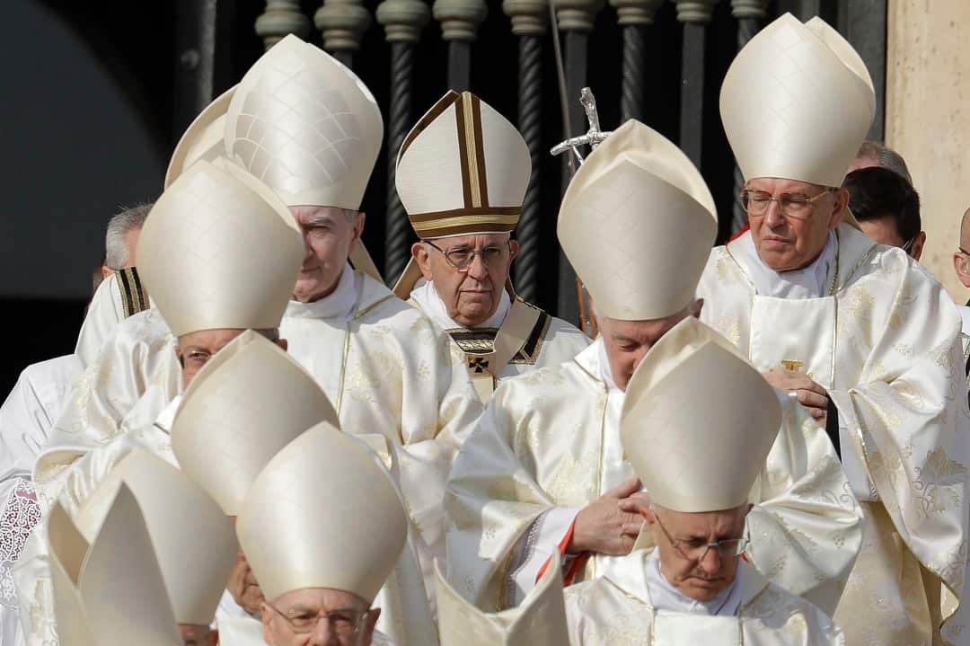 Pope Francis arrives for a canonization ceremony in St. Peter's Square at the Vatican.