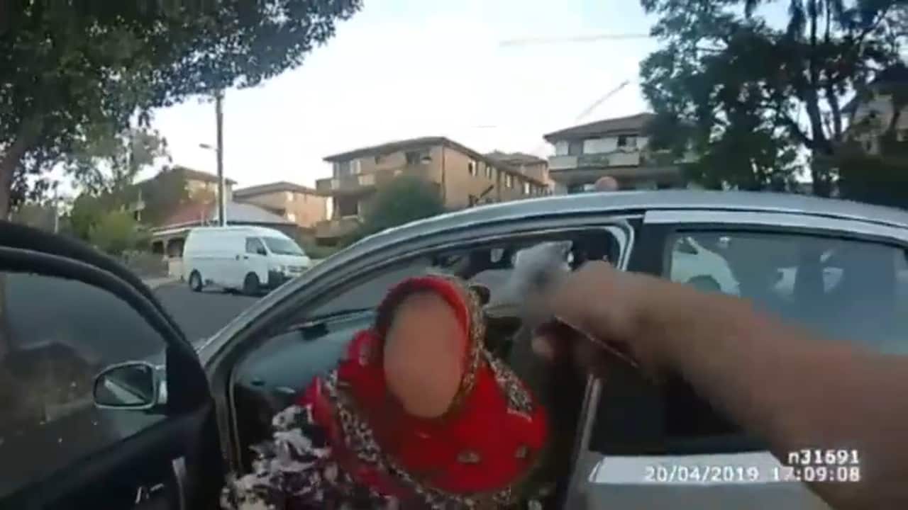 Video footage shows 24-year-old woman and her stepmother being pulled over and belittled by two officers