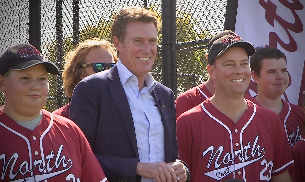 Member for Pearce Christian Porter campaigns in his electorate.