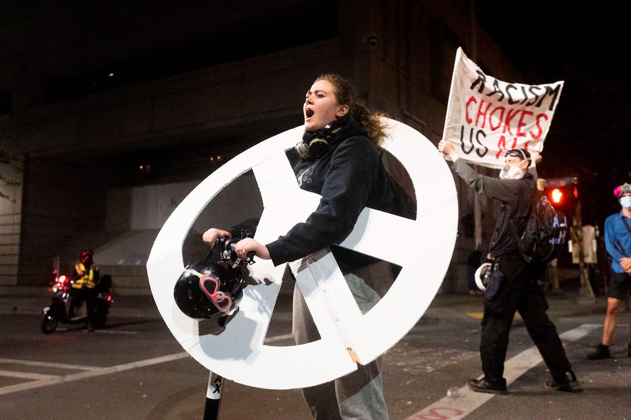A protester chants at a Black Lives Matter rally in Portland