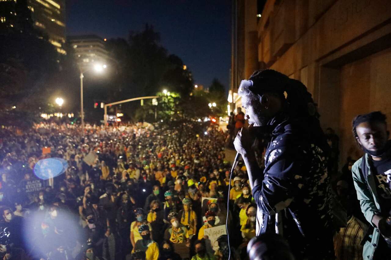 Black Lives Matter activists spoke in Portland, Ore., Thursday evening, July 23, 2020. (Octavio Jones/The New York Times)