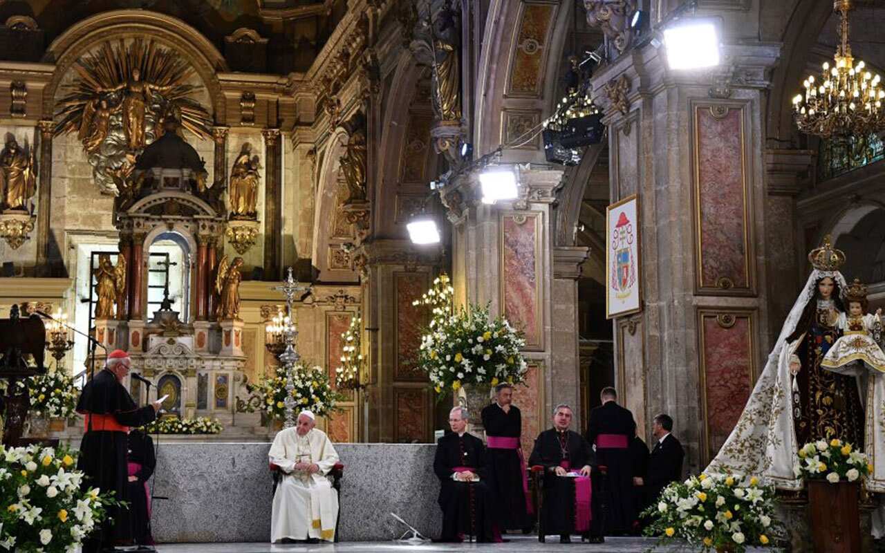 Pope Francis walks upon arrival at Santiago's Cathedral on January 16, 2018.