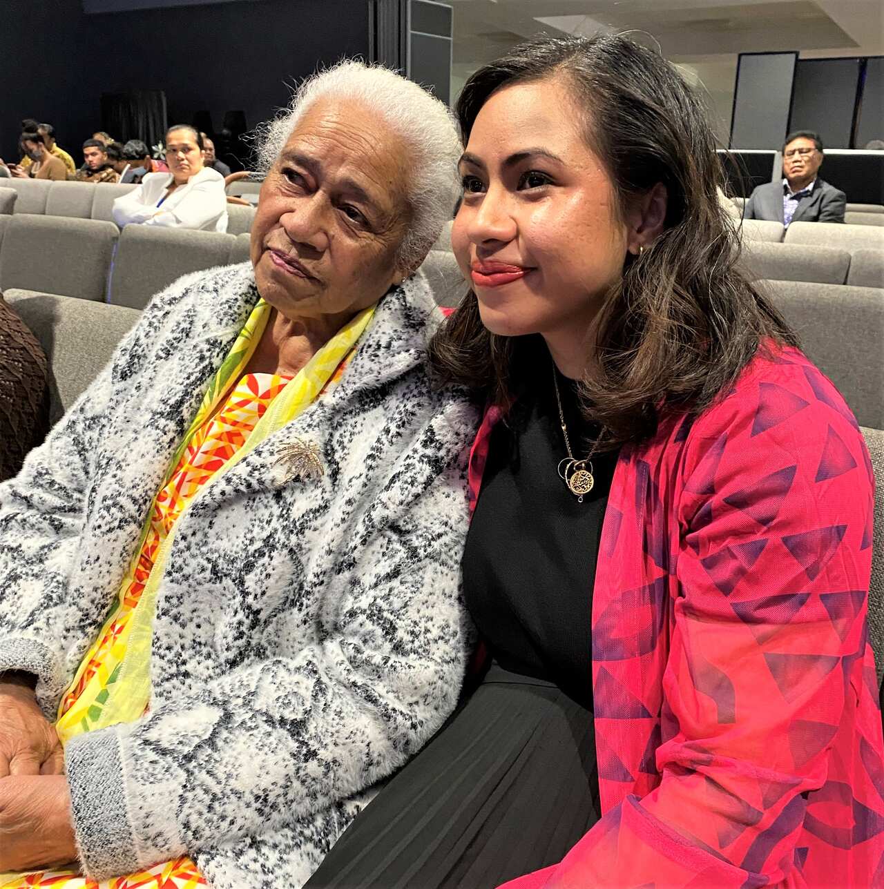 Princess Avia and her grandmother Moira Logo in church.