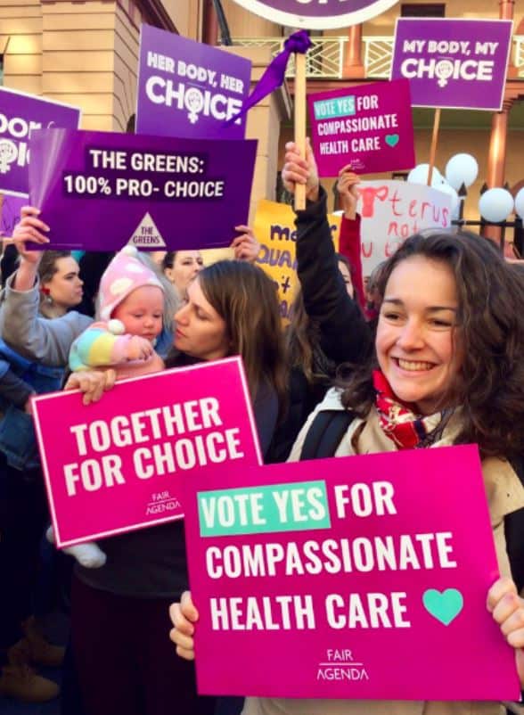Pro-choice supporters rally outside NSW parliament. 