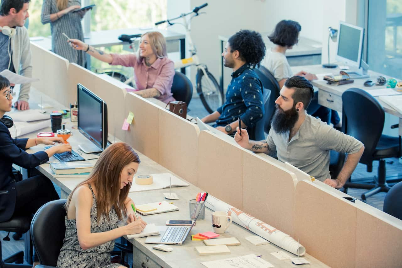 Professionals coworking in shared office space