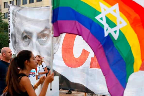 The demonstration comes after parliament only approved surrogacy for single women or those unable to bear children.