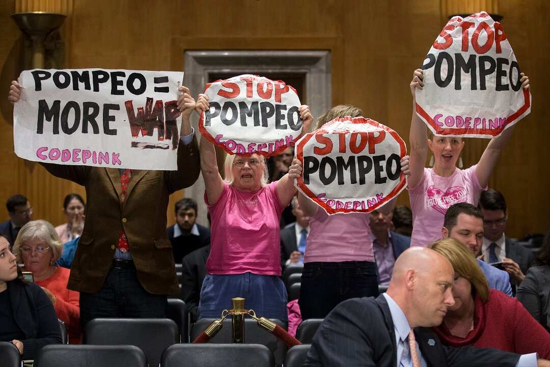 Protesters at the nomination hearing of former CIA Director Mike Pompeo.