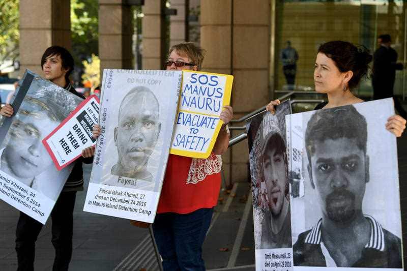 Manus Island protesters gather outside the Immigration Department building in Melbourne.