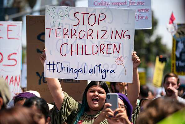 Activists gather to protest ICE and the Trump administrations immigration and detention policies in Los Angeles.