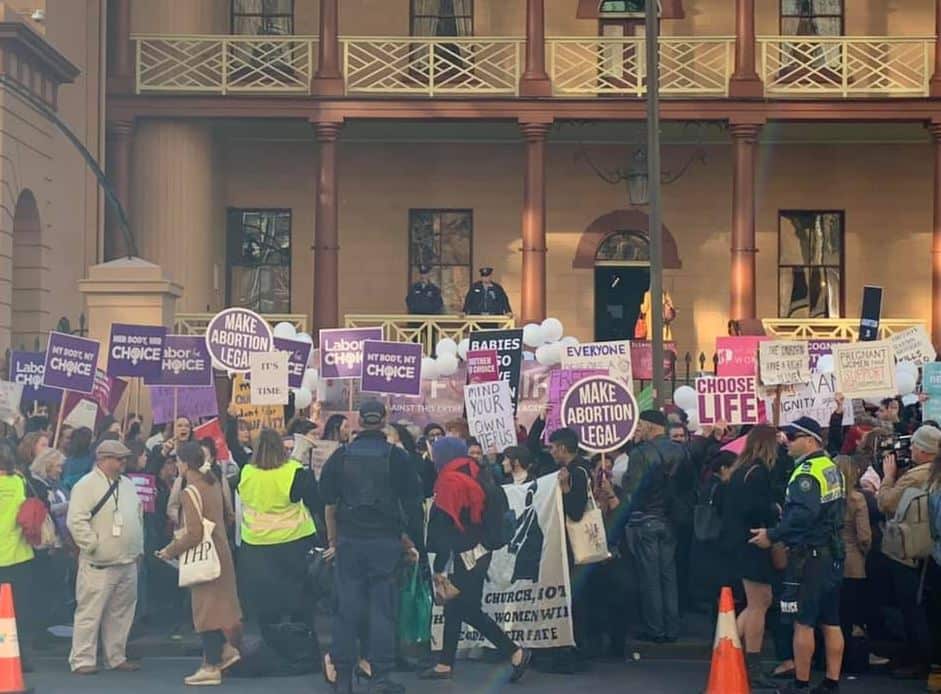 Police attempt to corral pro-choice protesters outside NSW Parliament on Macquarie St, Sydney. 
