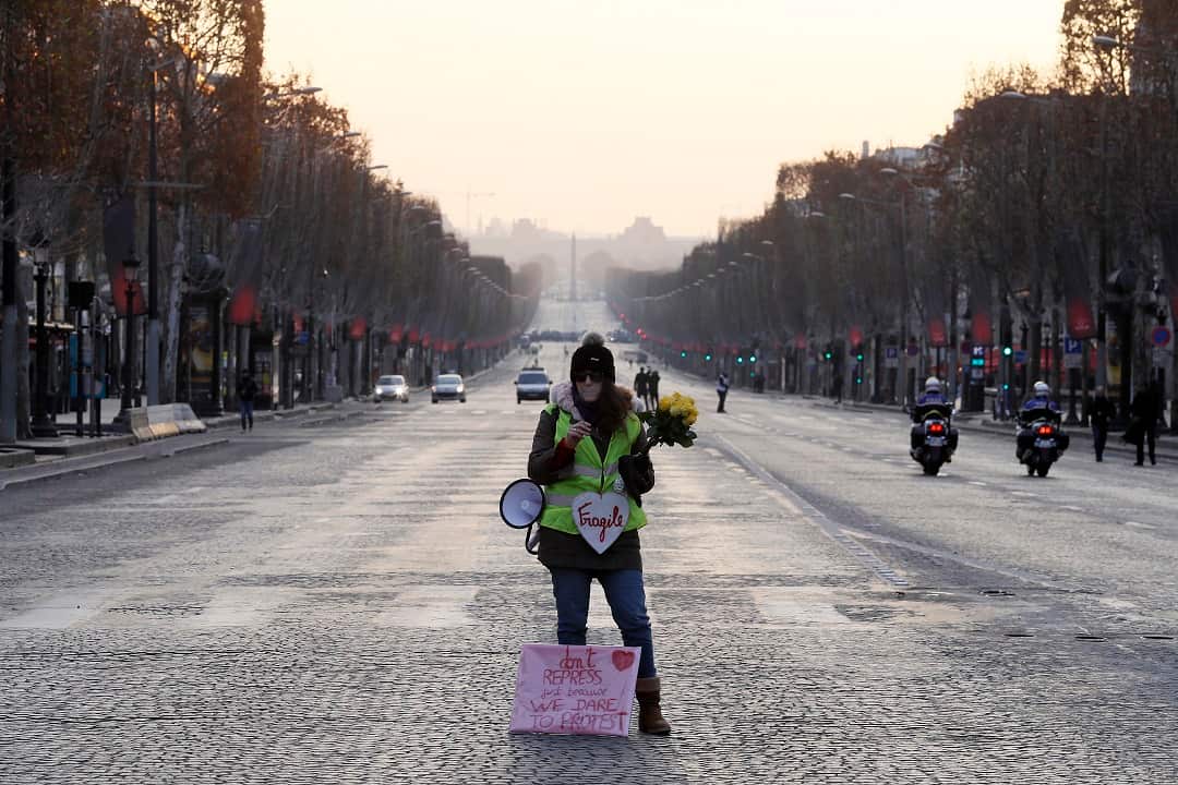 'Yellow vest' protesters begin to gather in Paris.