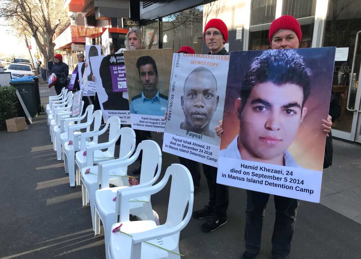 A protest outside Bill Shorten's Moonee Ponds office showing 12 chairs in a row to remember the 12 people who've died in detention centres.