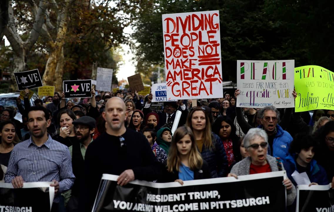 Protesters demonstrate near Pittsburgh's Tree of Life Synagogue where President Donald Trump and first lady Melania Trump were visiting.