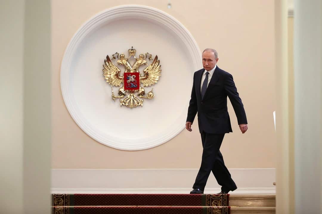Vladimir Putin enters to take the oath during his inauguration ceremony as Russia's president in the Grand Kremlin Palace in Moscow.