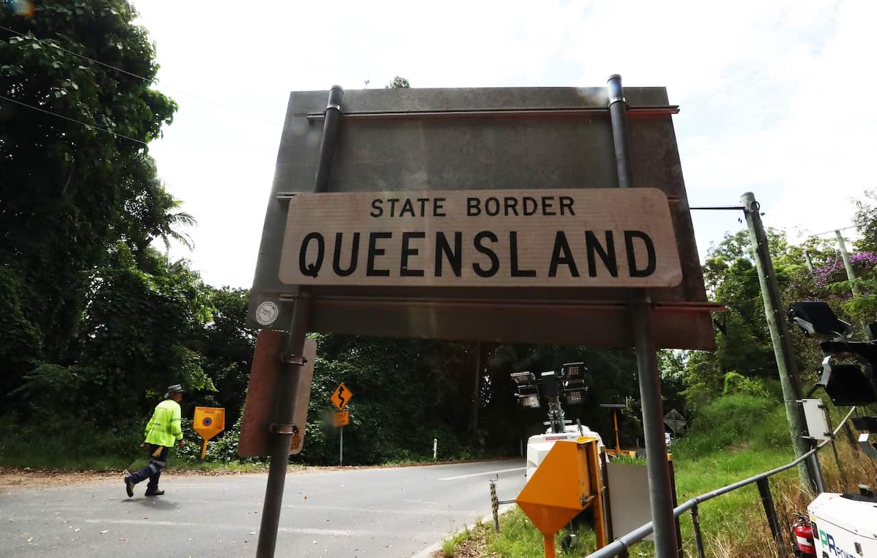 A sign at Tomewin at the border between New South Wales and Queensland.