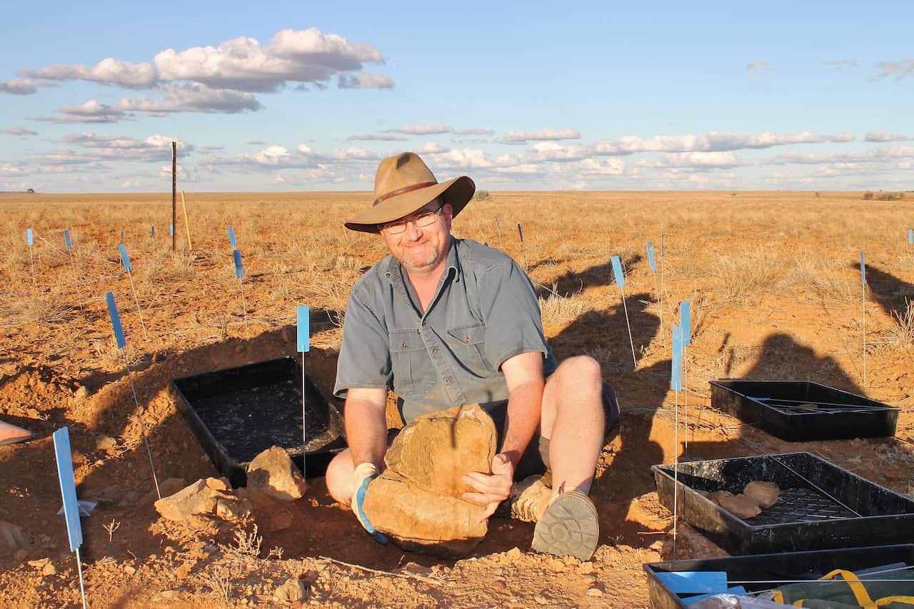 Queensland Museum palaeontologist Scott Hocknull on a dig.
