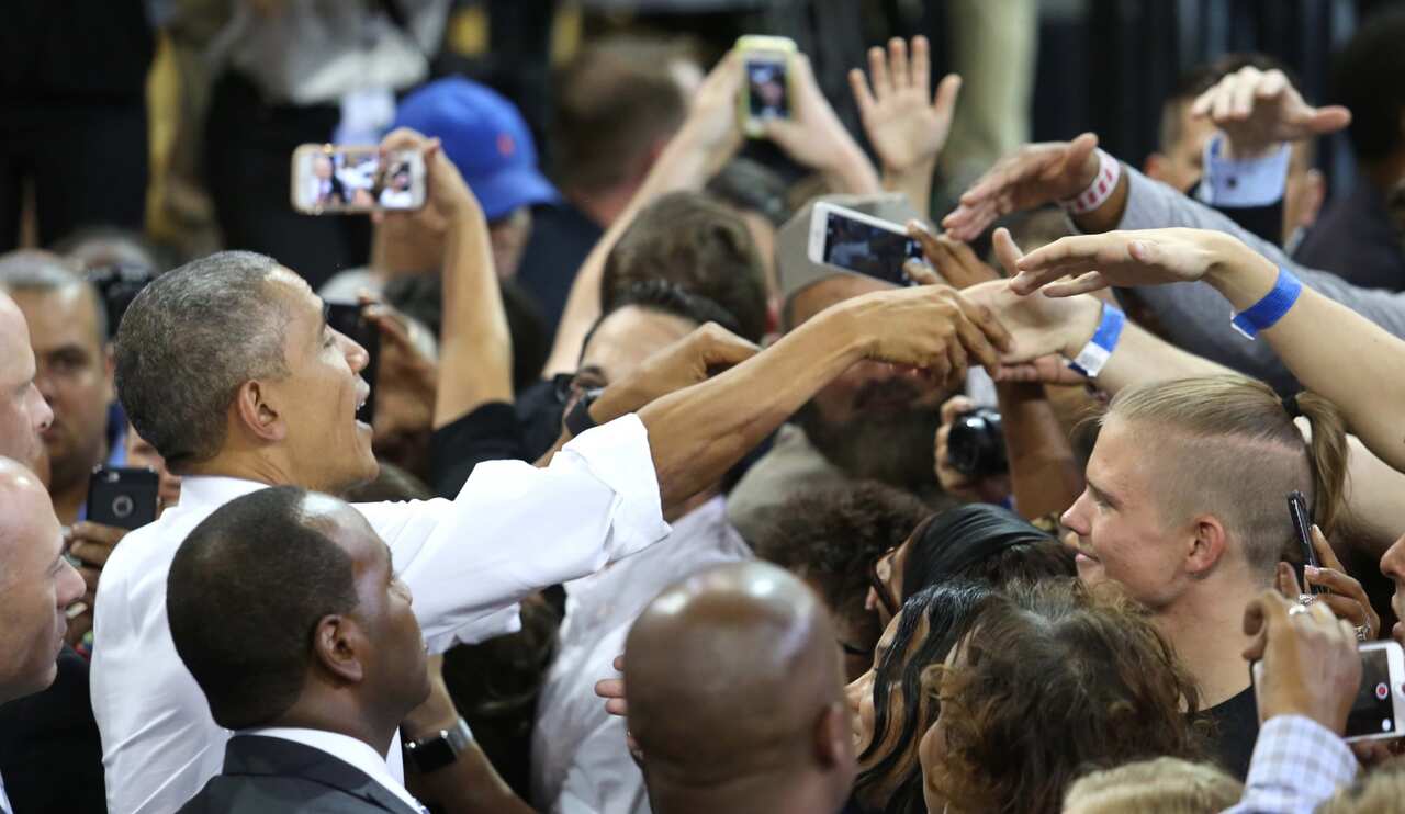 President Barack Obama greets supporters at a rally for the Hillary Clinton campaign at the University of Central Florida, Friday, Oct. 28 2016