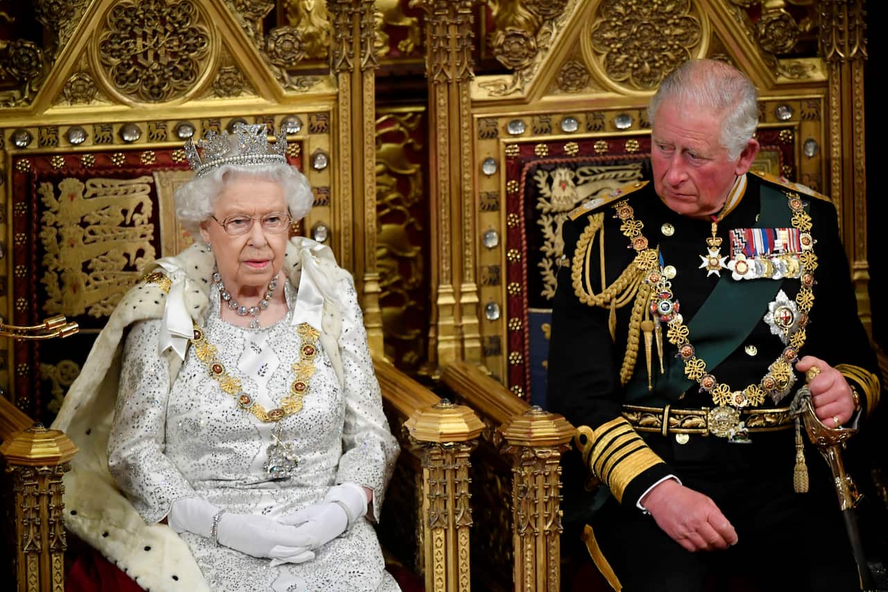 Queen Elizabeth II and Prince Charles attend the official State Opening of Parliament.