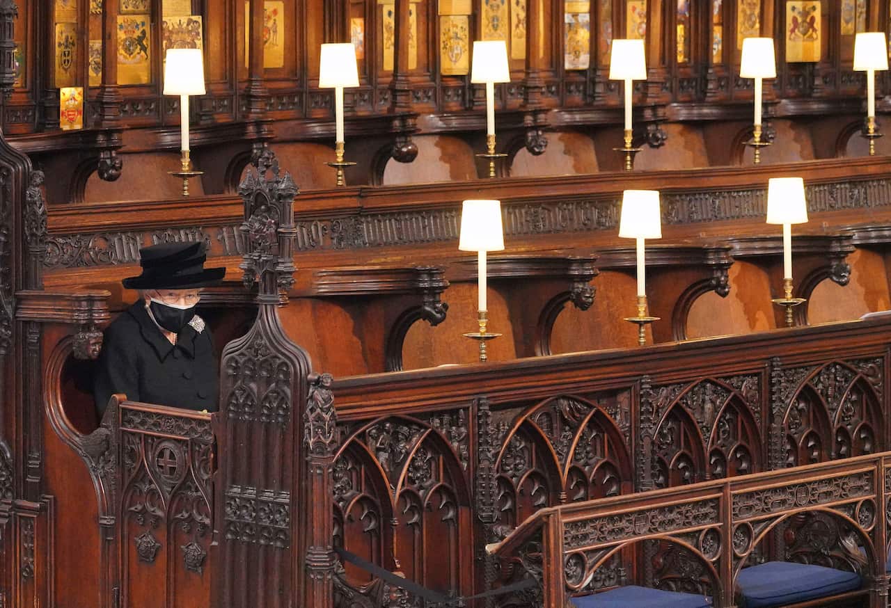 Queen Elizabeth sits alone during the funeral for her husband Prince Philip.