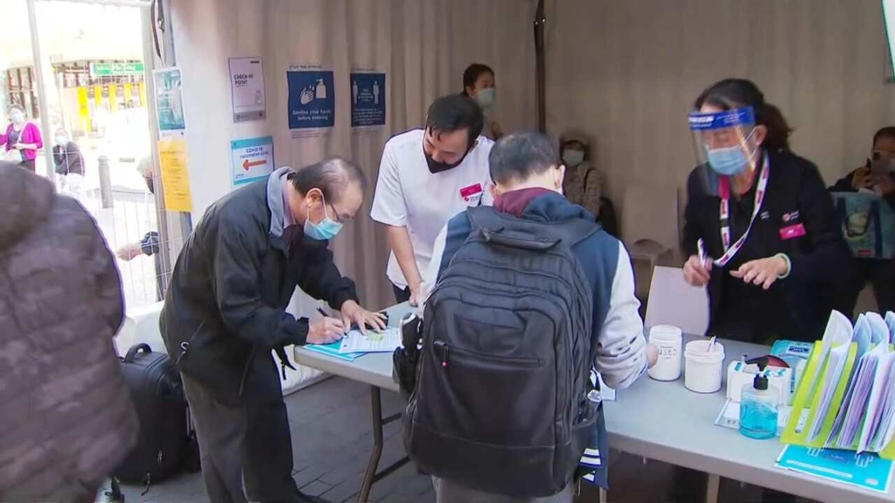 Pharmacist Quinn On helping members of the community get their COVID jabs at his pharmacy.