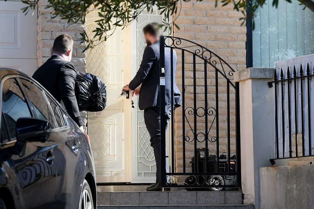 Federal agents enter the home of NSW Labor MP Shaoquett Moselmane in Rockdale, Sydney.