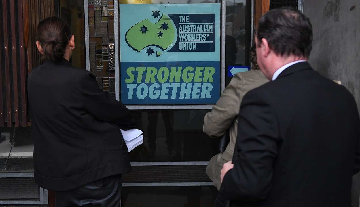 Australian Federal Police officers raid the AWU headquarters in Sydney and Melbourne.