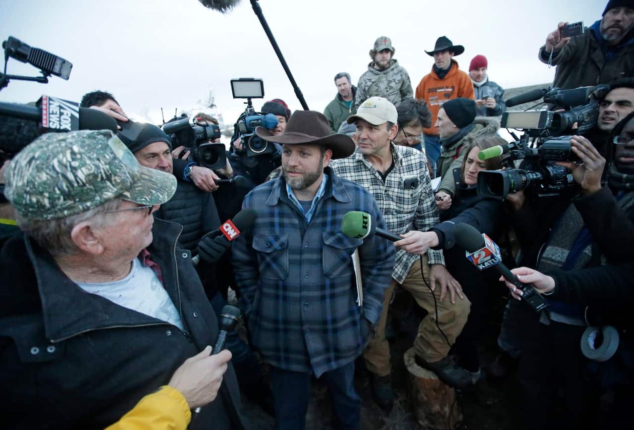 Ammon Bundy, one of the sons of Nevada rancher Cliven Bundy, speaks to reporters on Jan 7 (AAP)