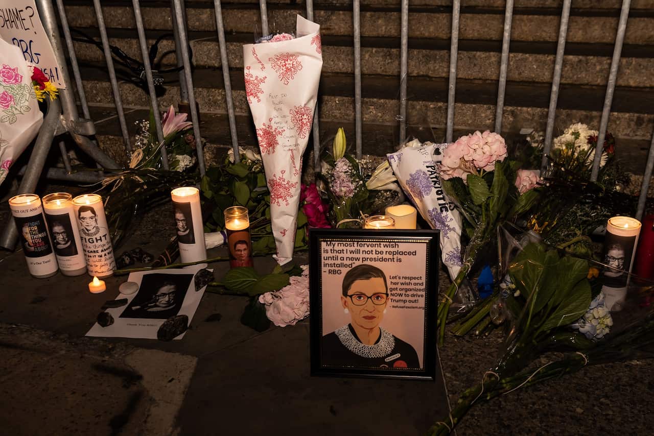 Crowds gathered at the Supreme Court in the hours after Ruth Bader Ginsburg’s passing.  