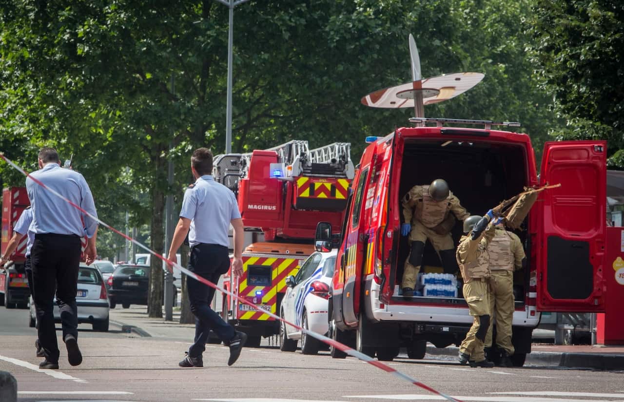 A bomb squad arrives at the scene following a shooting in Liege, Belgium, 29 May 2018.