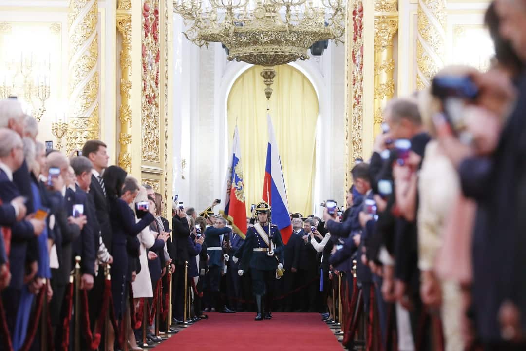 Honour Guards carry the Russian Presidential Standard and Russian National Flag during Vladimir Putin's inauguration ceremony.