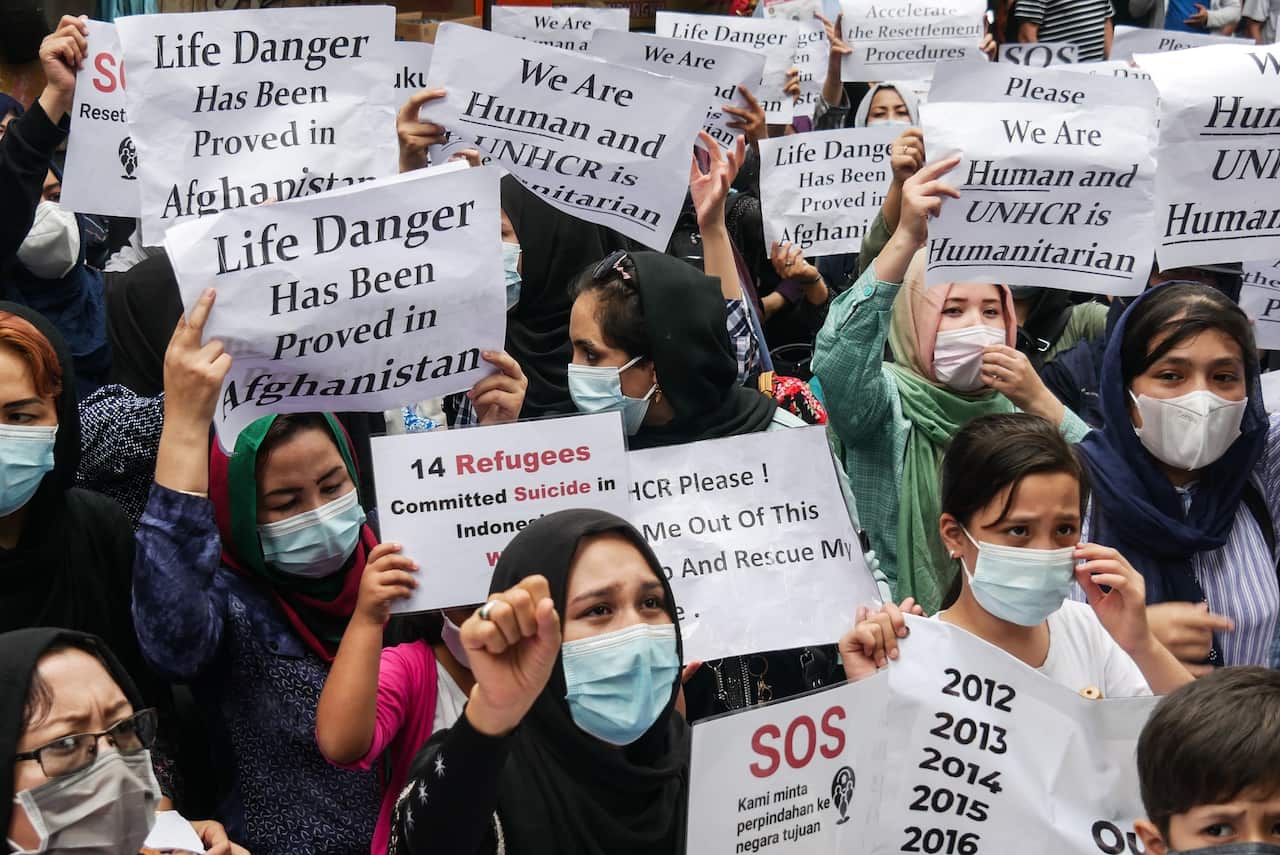 Afghan refugees protest outside UNHCR in Indonesia