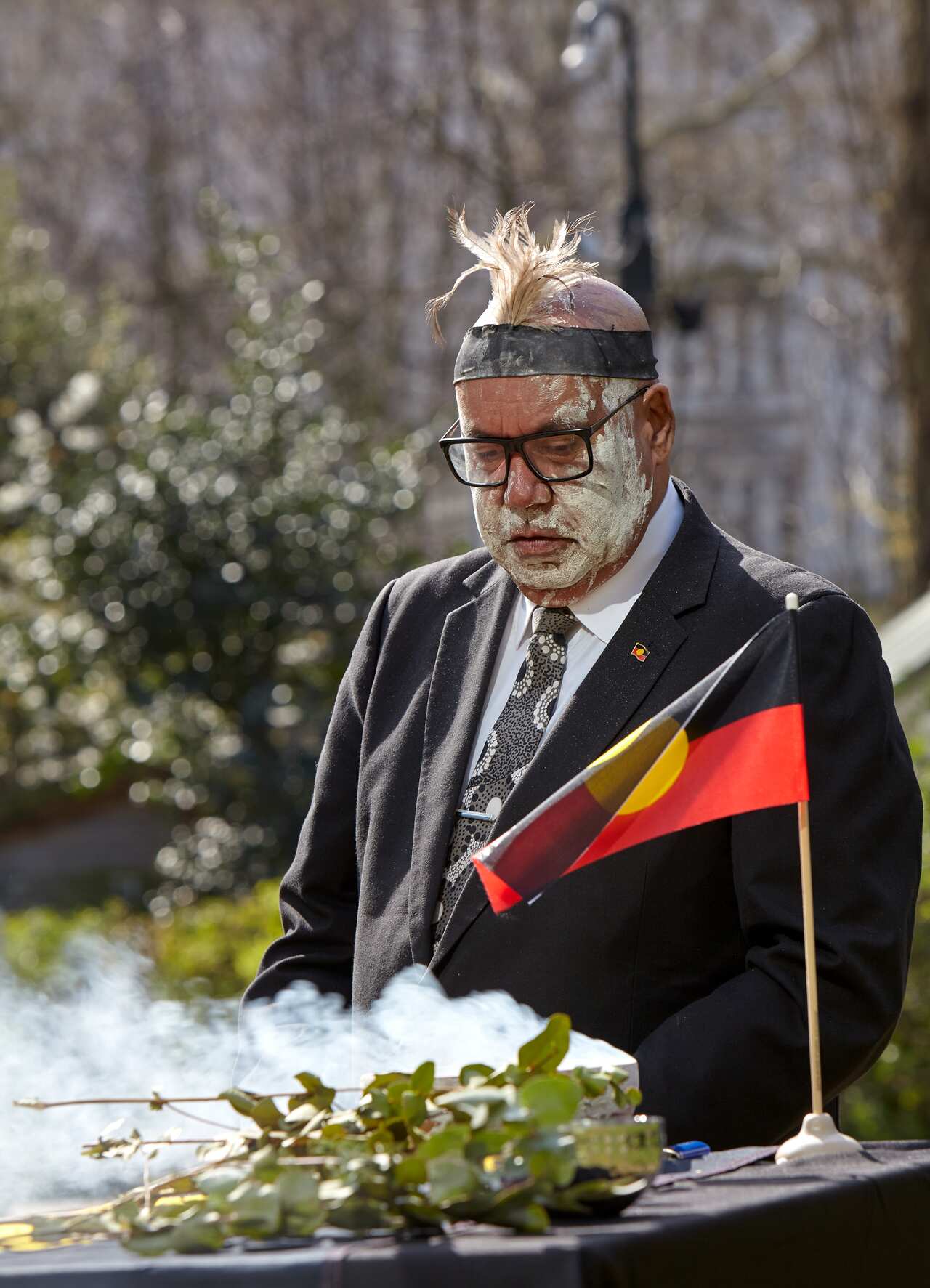 Professor Peter Buckskin formally receives the remains in London.