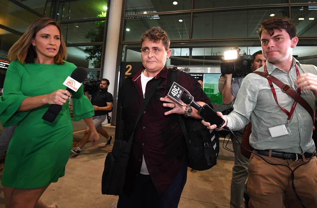 Bali Nine drug smuggler Renae Lawrence was pursued by media as she made her way to the terminal transfer bus. 