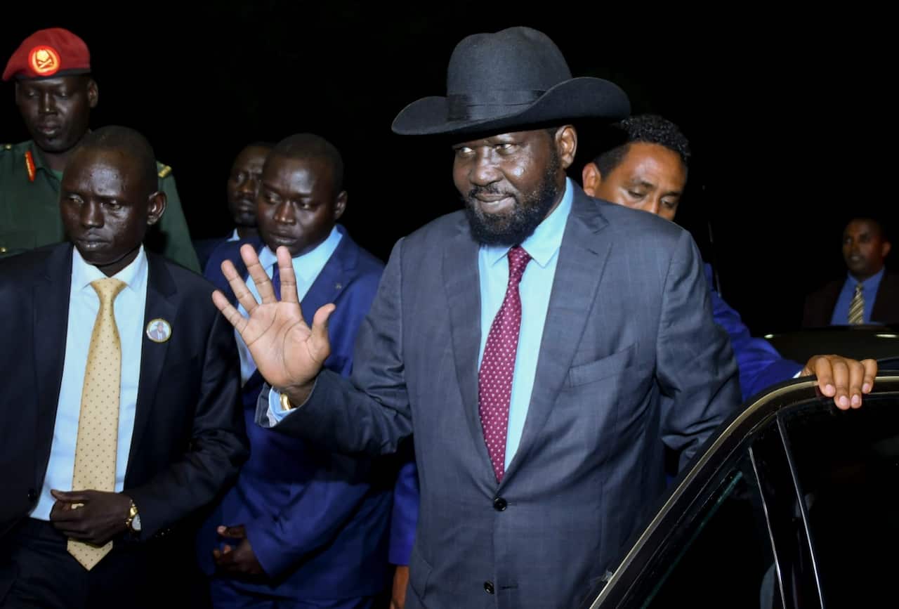 South Sudanese President Salva Kiir gestures as he arrives for the meeting with his rival and the rebel leader Riek Machar in Addis Ababa, Ethiopia