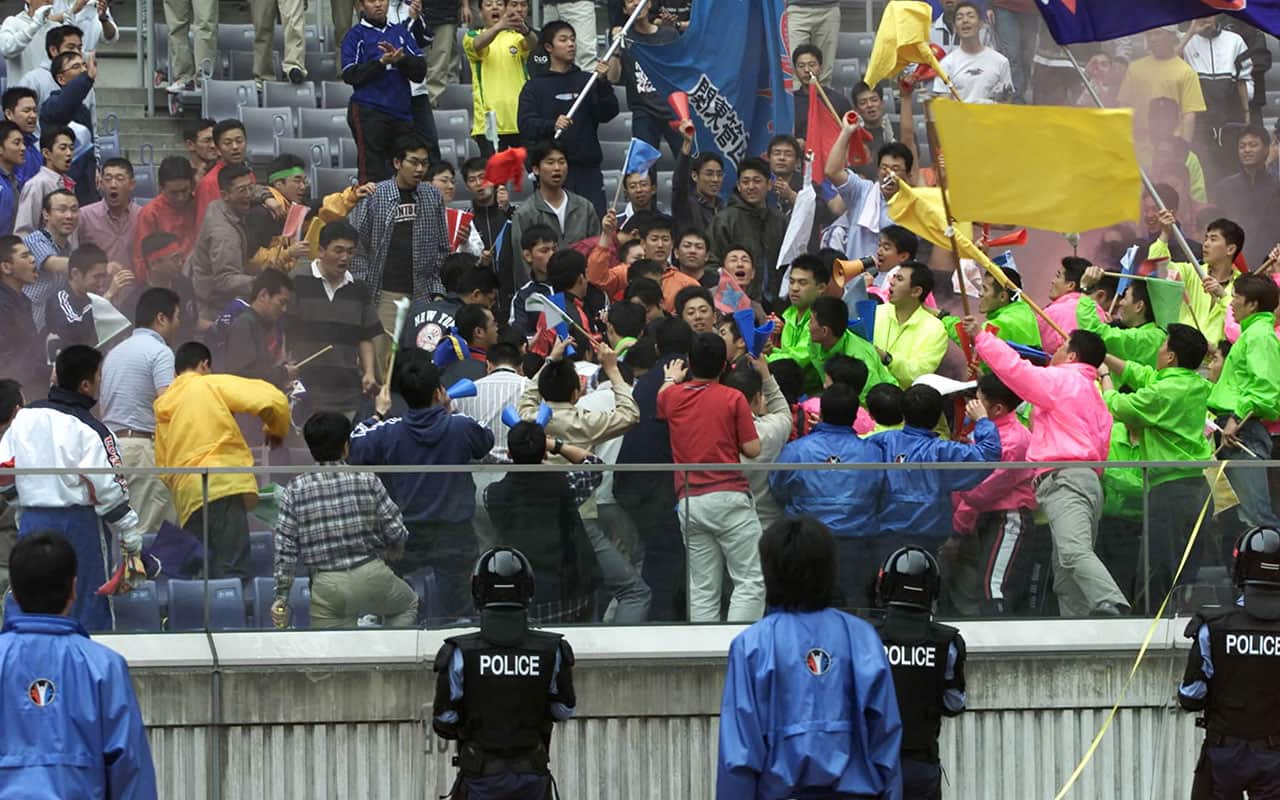 Riot police try to quell hooligans in a drill held at Yokohama athletic ground April 10, 2002 in Yokohama, Japan.