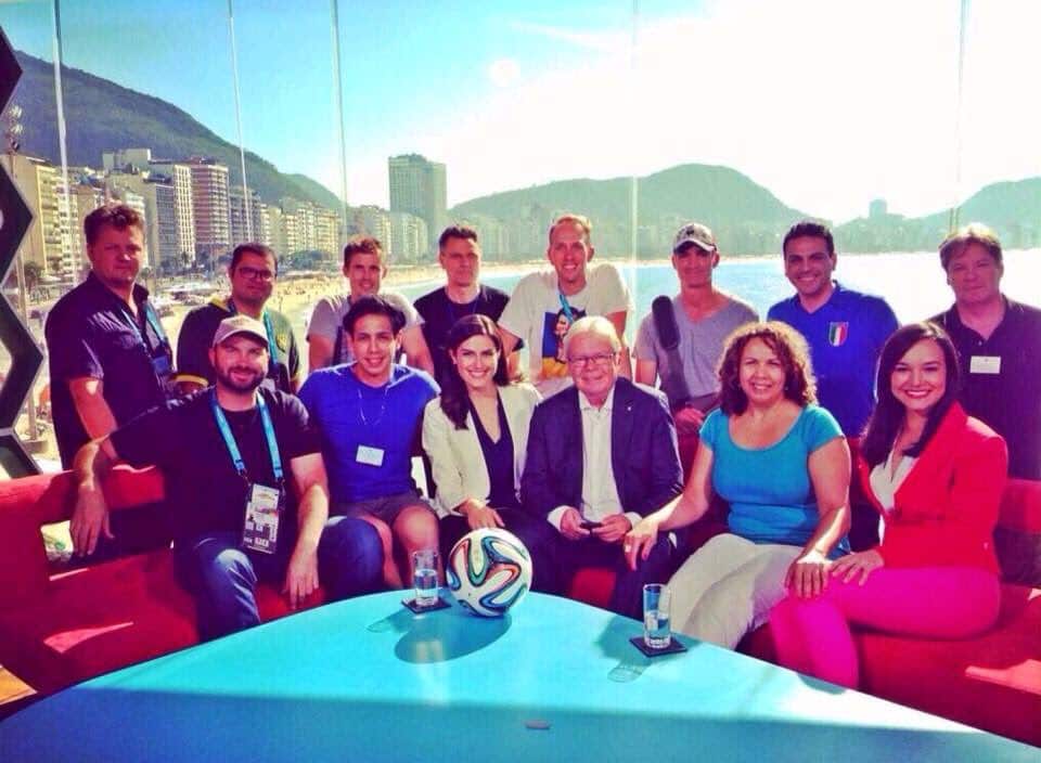 Rob Grasso (second from right, back) with Les Murray and the SBS crew in 2014.