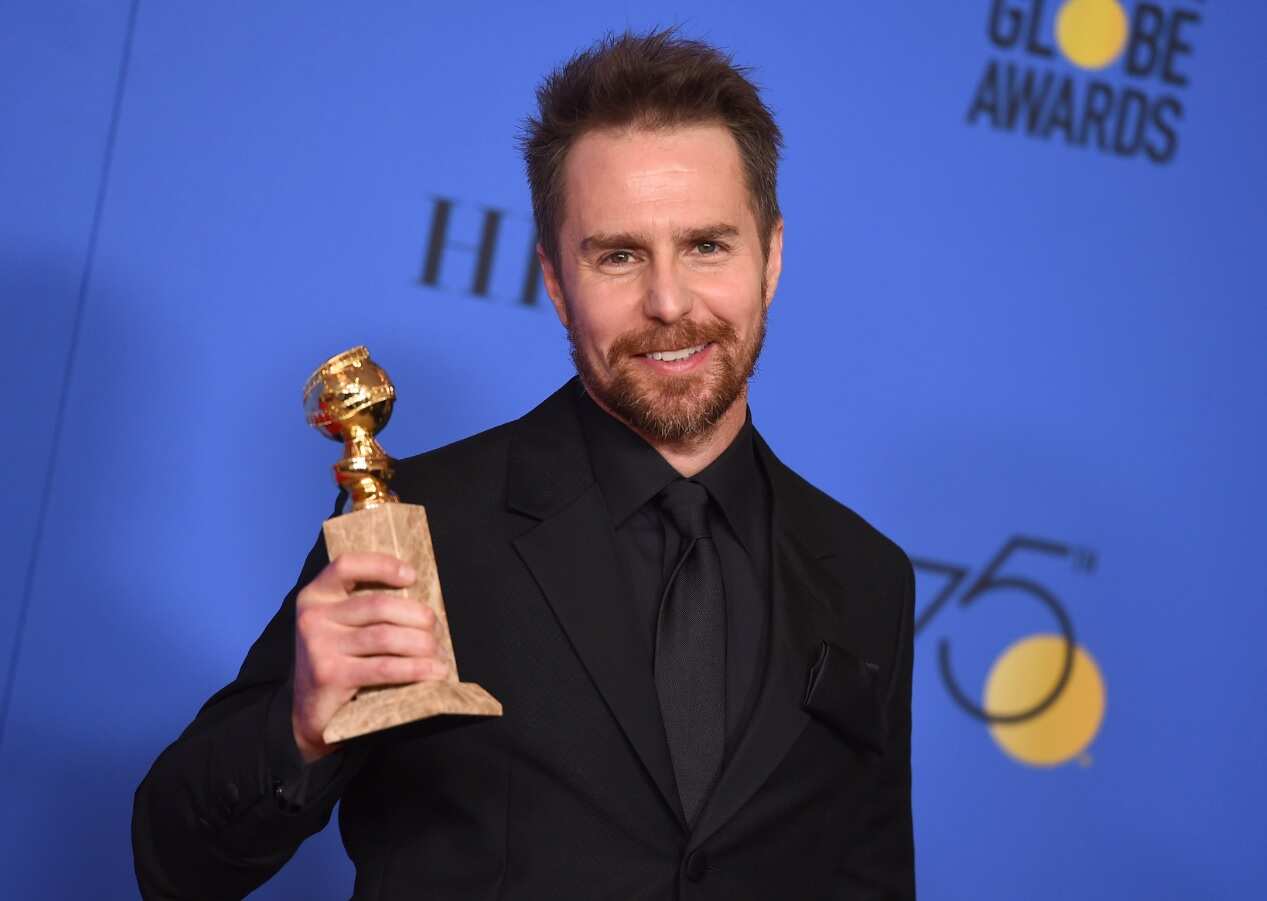 Sam Rockwell poses in the press room with the award for best performance by an actor in a supporting role in any motion picture (AAP)