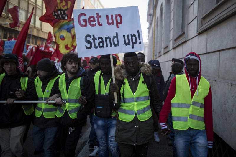 Protesters on the streets of Rome. New laws will make it easier for Italy to expel migrants.