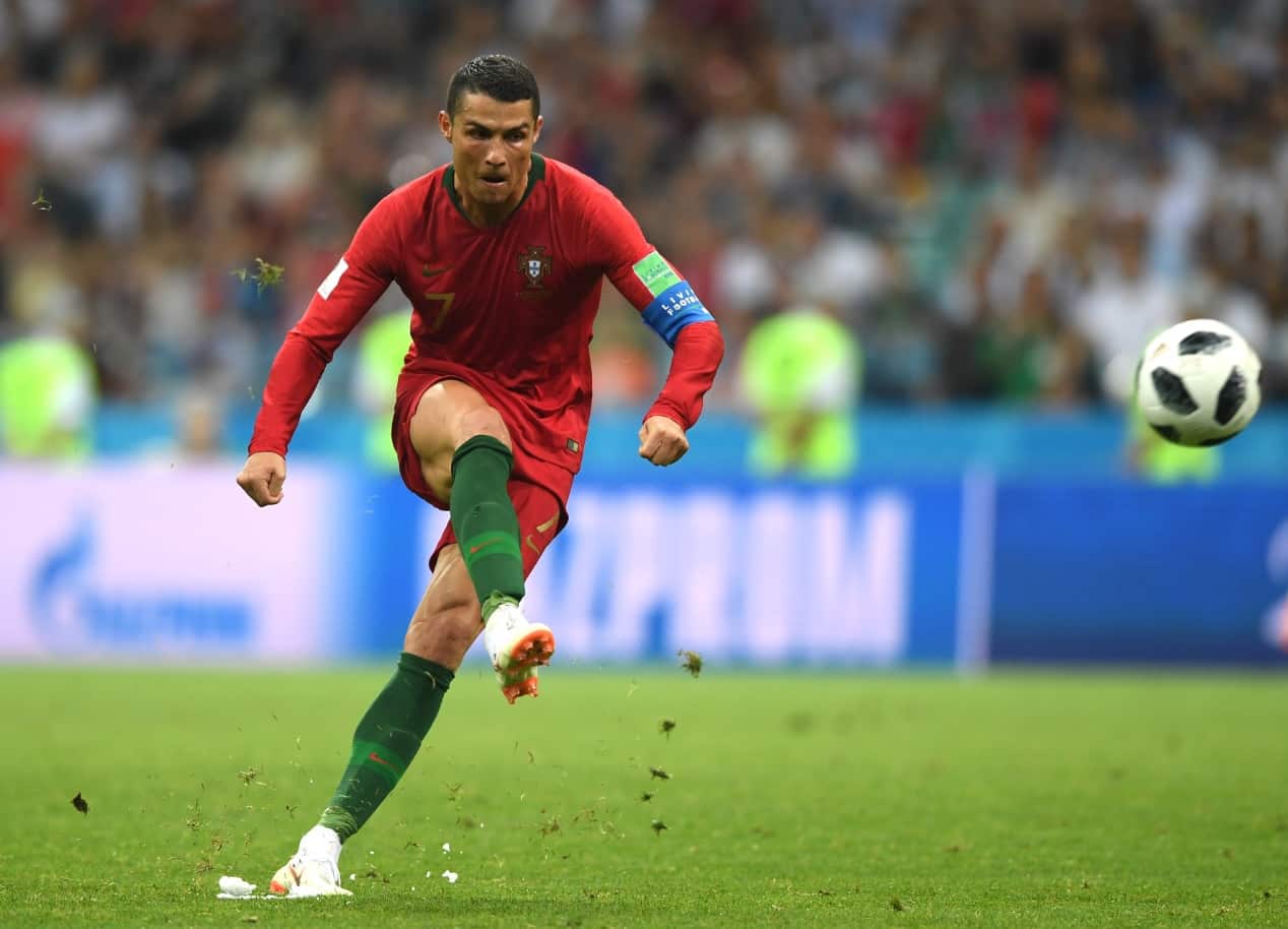 Cristiano Ronaldo of Portugal scores his team's third goal during the 2018 FIFA World Cup Russia group B match between Portugal and Spain