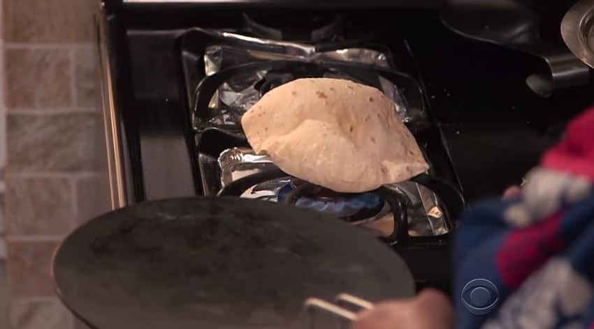colbert learning to cook indian food