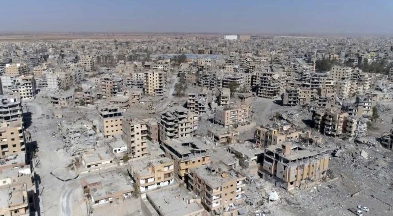 This Thursday, Oct. 19, 2017 frame grab made from drone video shows damaged buildings in Raqqa, Syria (AAP)