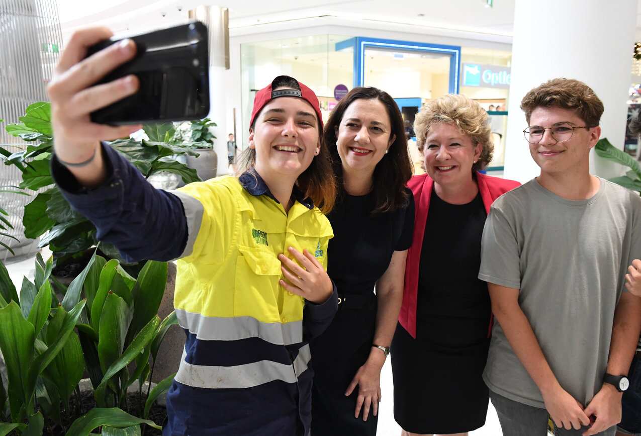 Queensland Premier Annastacia Palaszczuk (second from left) and Labor candidate for Mansfield Corrine McMillan (third from left) with supporters in Brisbane.