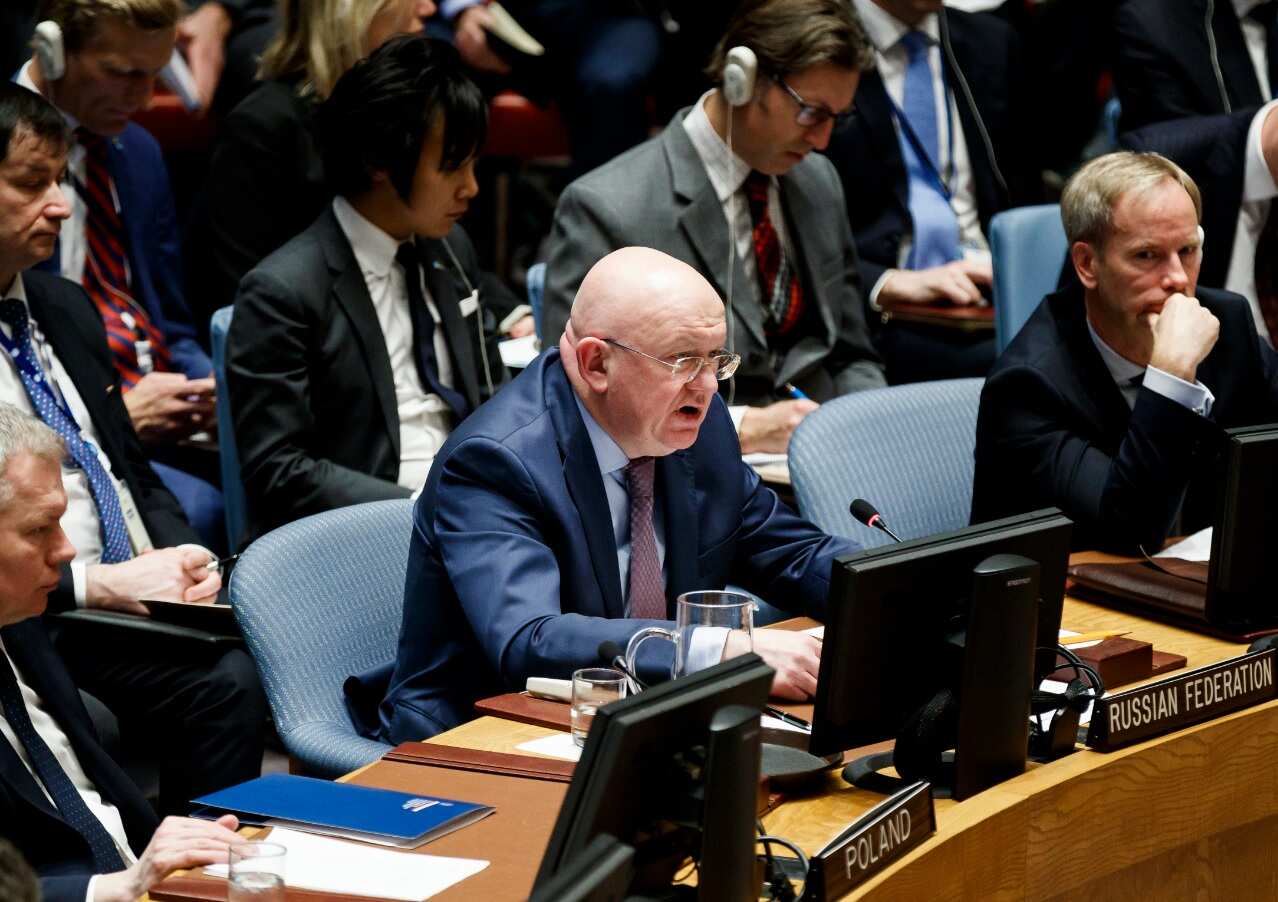 Vassily Nebenzia (C), Russia's Permanent Representative to the United Nations, addresses an emergency United Nations Security Council on April 10