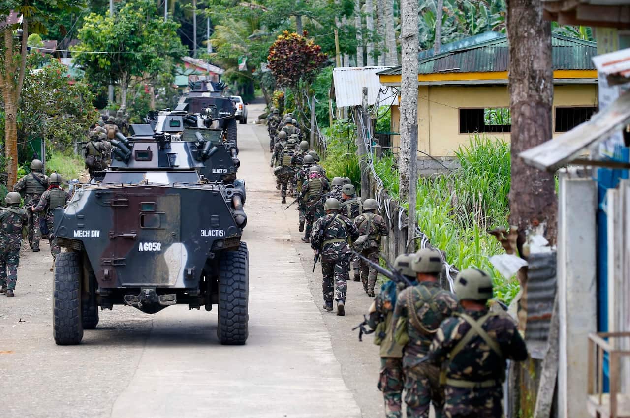 Government troops head to the frontline as fighting with Muslim militants in Marawi city enters its second week, Tuesday, May 30, 2017