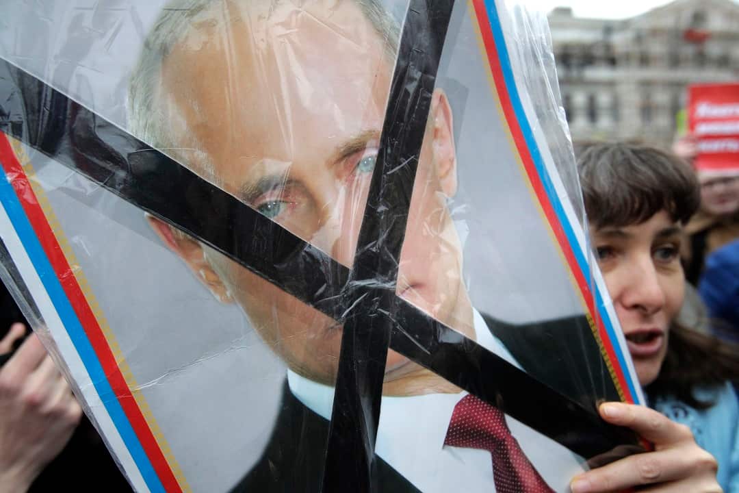 Demonstrators chanted "Putin's fourth term should be in prison". 